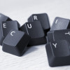 Webinar Replay: Organizational Threat Modeling the word SECURITY spelled with keys taken from keyboard